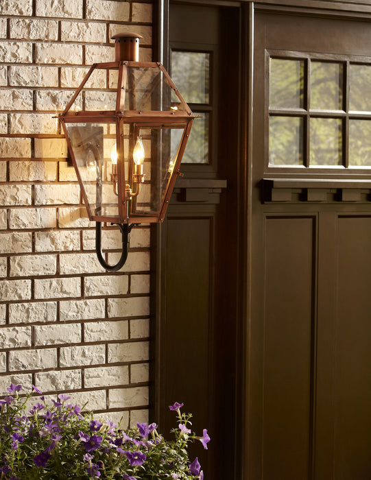 Four Light Outdoor Wall Lantern from the Rue De Royal collection in Aged Copper finish