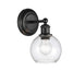Concord Sconce shown in the Matte Black finish with a Seedy shade