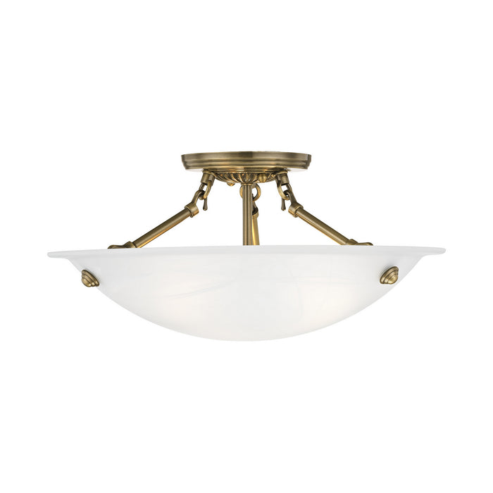 Three Light Ceiling Mount from the Oasis collection in Antique Brass finish