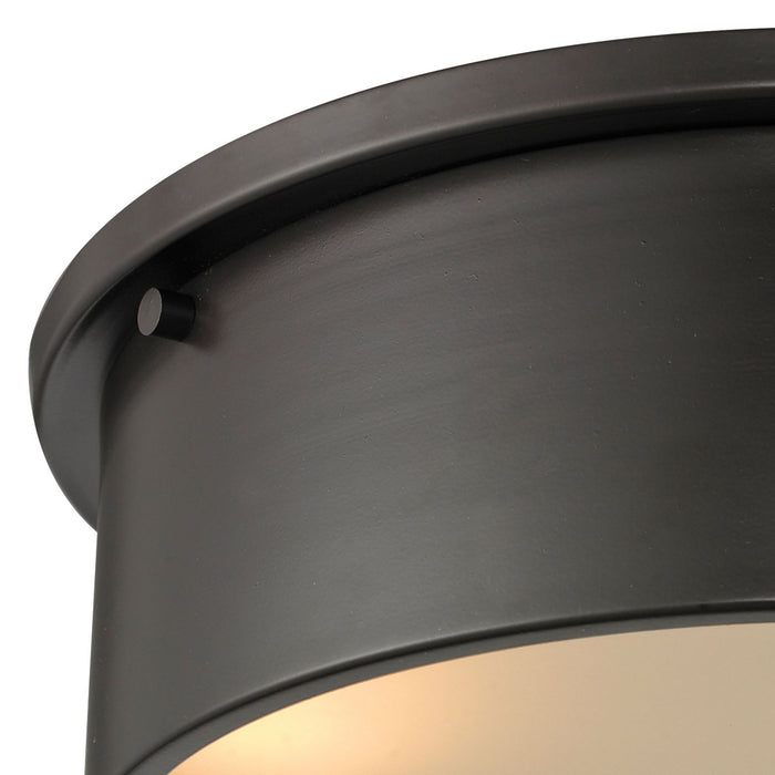 Three Light Flush Mount from the Simpson collection in Oil Rubbed Bronze finish