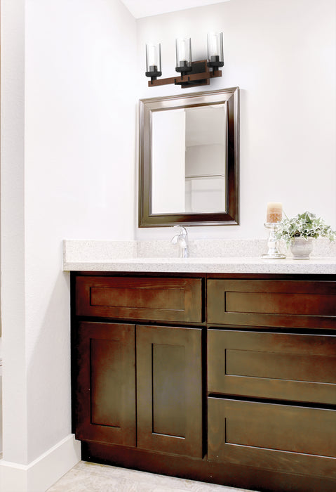 Three Light Vanity from the Okanagan collection in Graphite/Ironwood On Metal w/ Clear Glass finish