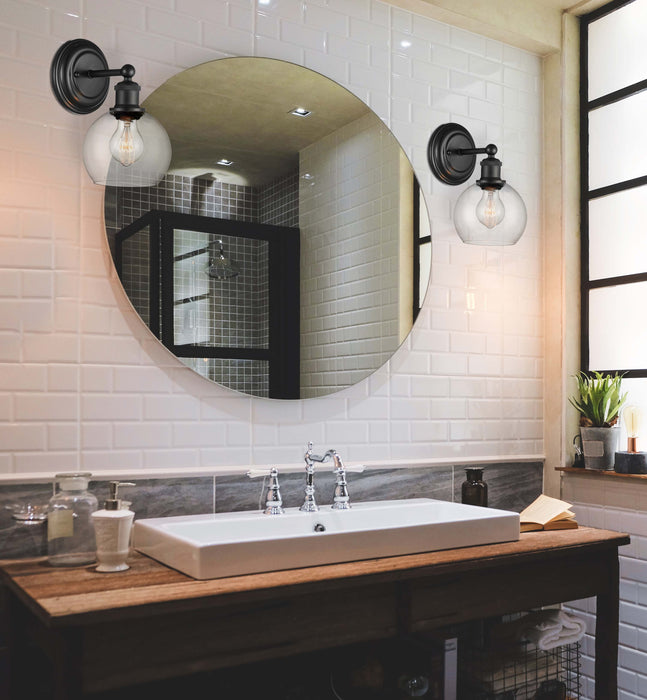 Concord Sconce shown in the Matte Black finish with a Clear shade