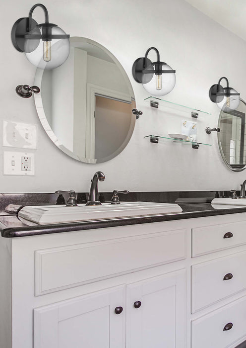 Sands Bath Vanity Light shown in the Matte Black finish with a Clear shade