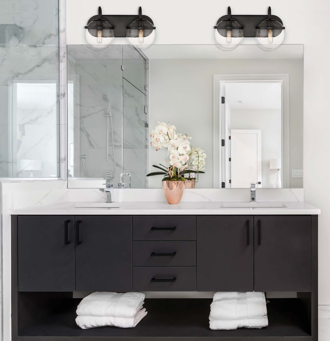 Sands Bath Vanity Light shown in the Matte Black finish with a Clear shade