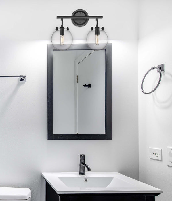 Span Bath Vanity Light shown in the Matte Black finish with a Clear shade