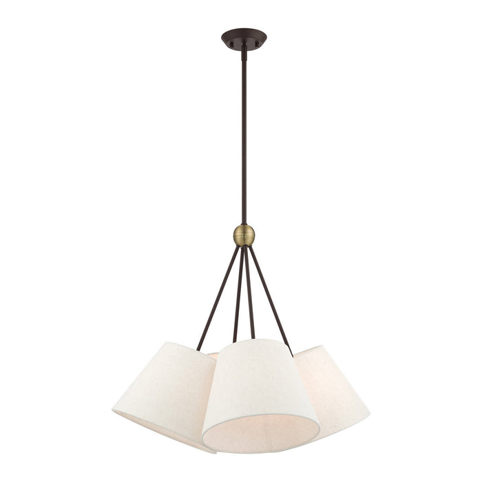Four Light Chandelier from the Prato collection in Bronze with Antique Brass Accents finish