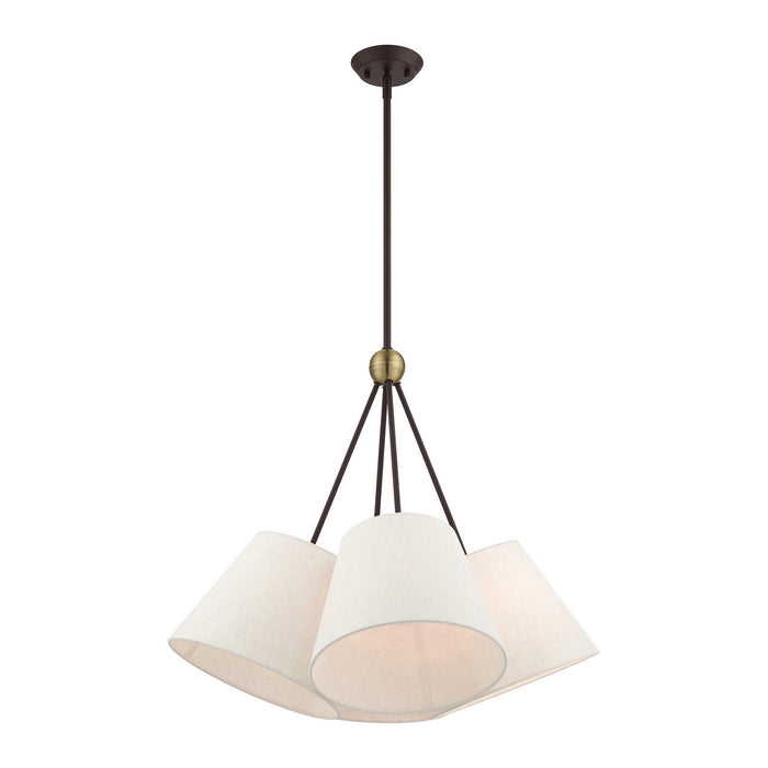 Four Light Chandelier from the Prato collection in Bronze with Antique Brass Accents finish