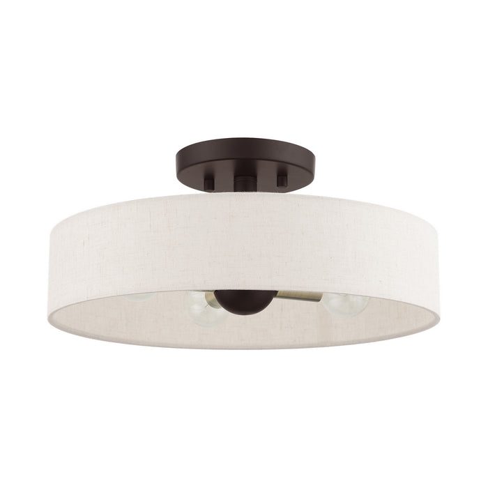 Four Light Semi Flush Mount from the Venlo collection in Bronze with Antique Brass Accents finish