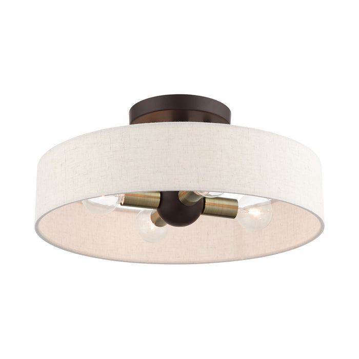 Four Light Semi Flush Mount from the Venlo collection in Bronze with Antique Brass Accents finish