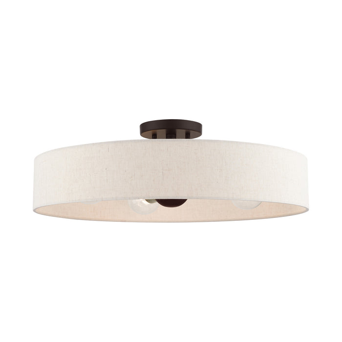 Four Light Semi Flush Mount from the Venlo collection in Bronze with Antique Brass Accents finish