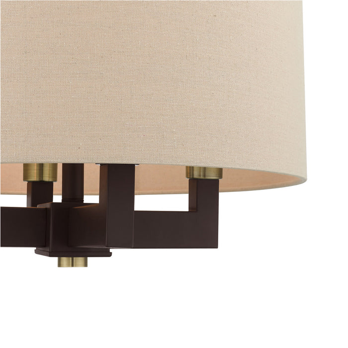 Four Light Chandelier from the Cresthaven collection in Bronze with Antique Brass Accents finish