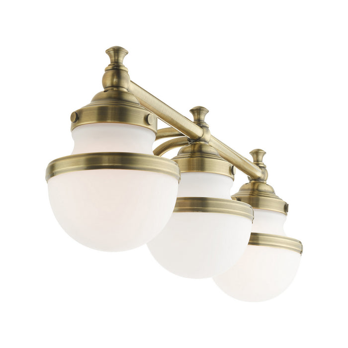 Three Light Vanity from the Oldwick collection in Antique Brass finish