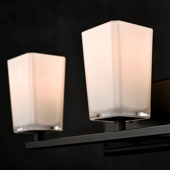 Three Light Vanity from the Riverside collection in Ebony w/ Silk Screen Opal Glass finish