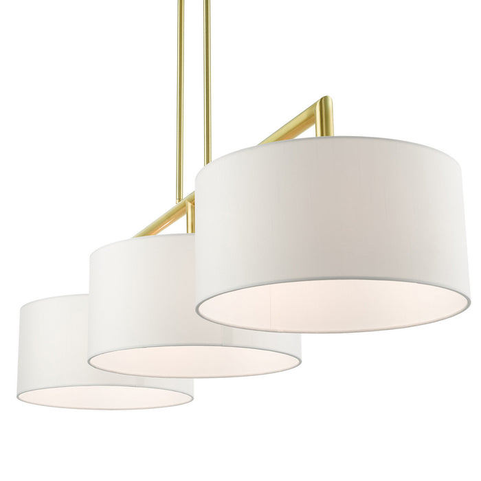 Three Light Linear Chandelier from the Meridian collection in Satin Brass finish