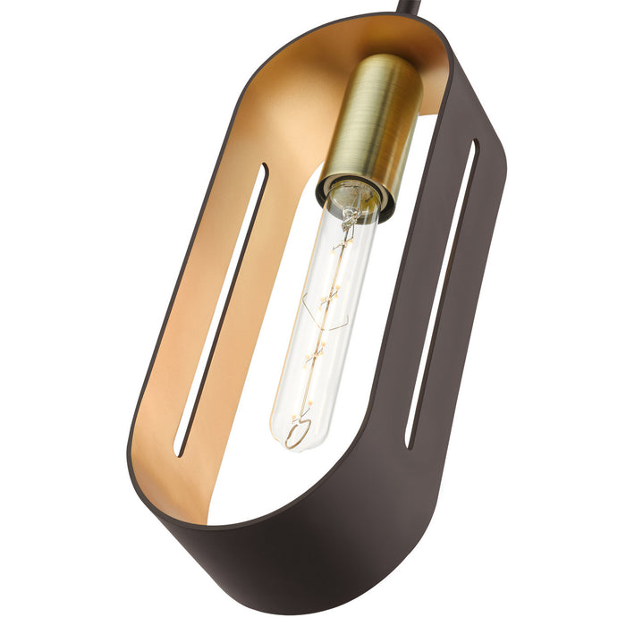 One Light Pendant from the Ravena collection in Bronze with Antique Brass finish