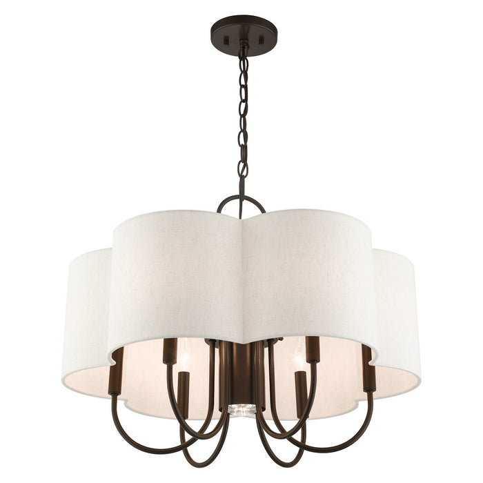 Seven Light Chandelier from the Solstice collection in English Bronze finish
