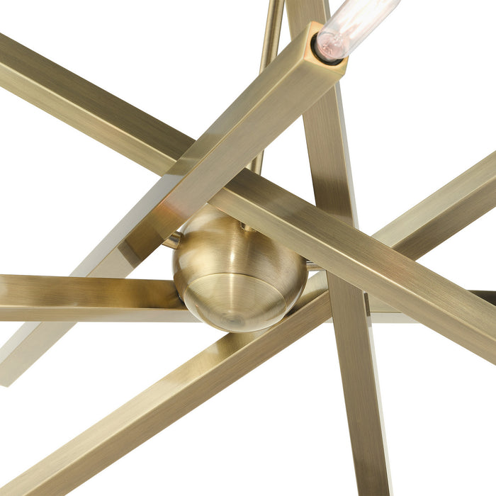 Ten Light Chandelier from the Monaco collection in Antique Brass finish