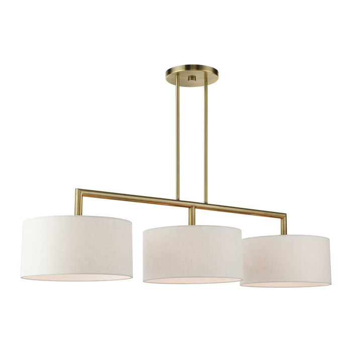 Three Light Linear Chandelier from the Meridian collection in Antique Brass finish