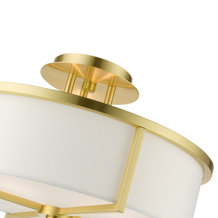 Three Light Semi Flush Mount from the Wesley collection in Satin Brass finish