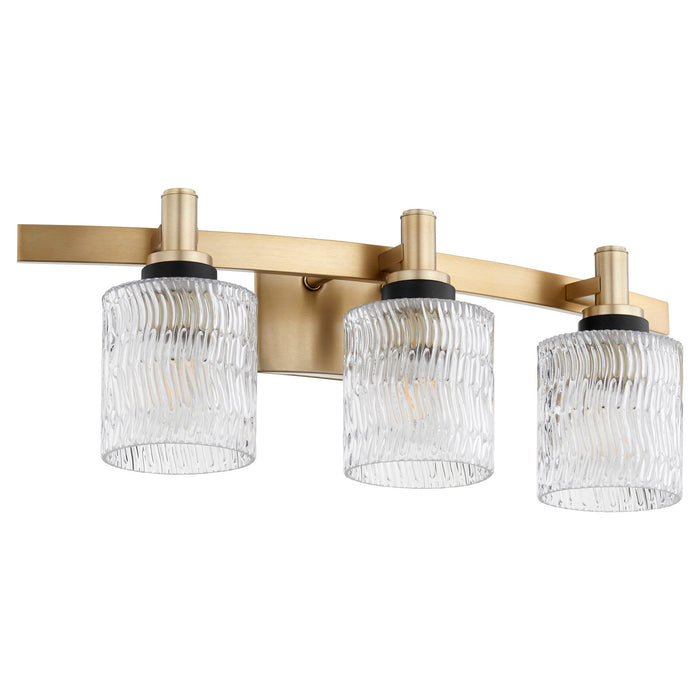 Three Light Vanity from the Stadium collection in Aged Brass finish