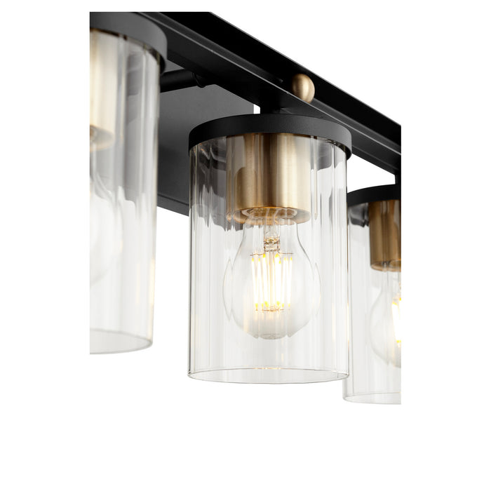 Three Light Vanity from the Empire collection in Noir w/ Aged Brass finish